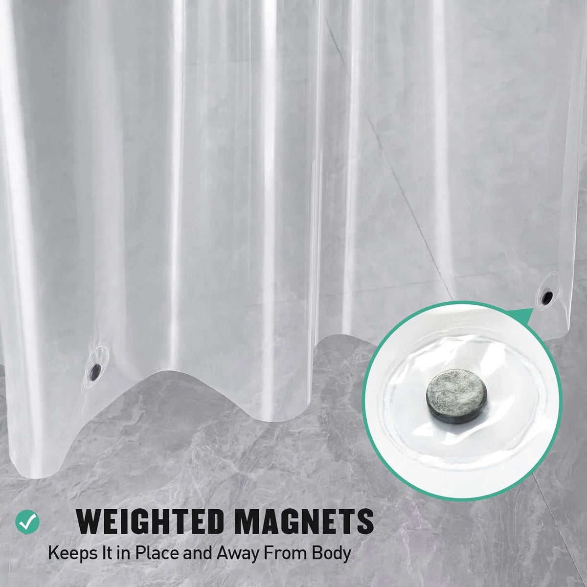 Clear shower curtain liner with weighted magnets keeping it in place and away from the body