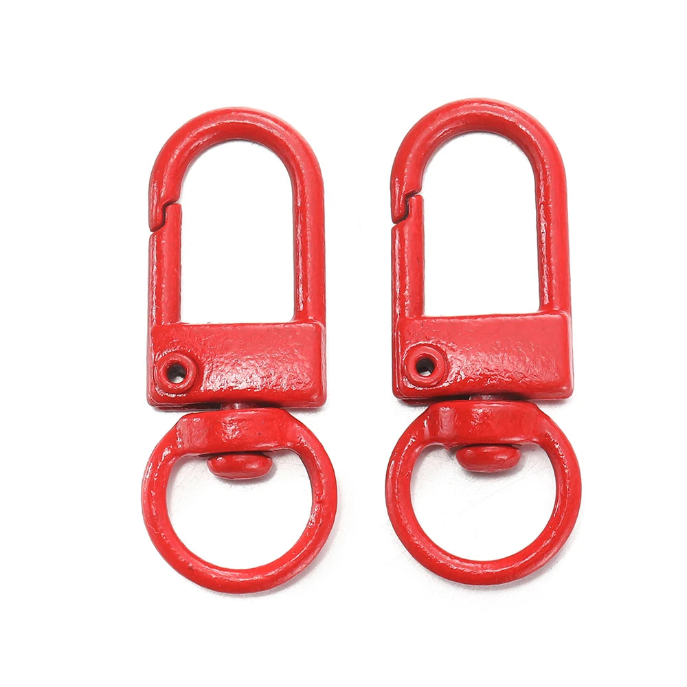 A pair of red alloy lobster clasp hooks for DIY jewelry making.