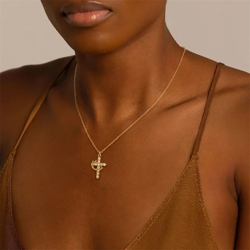 Rotating Cross Pendant Necklace with Rhinestone Detail