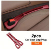 A pair of red car seat gap plugs designed to fill the space between seats.