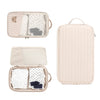 A beige stroller hanging diaper bag with separate storage compartments for baby clothes and accessories.