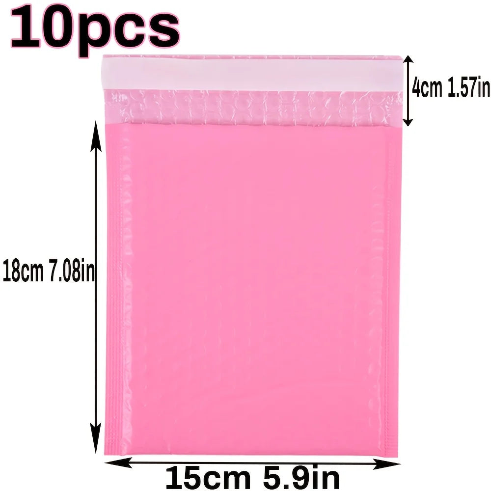 A pink self-seal padded bubble mailer with dimensions of 15cm by 18cm.