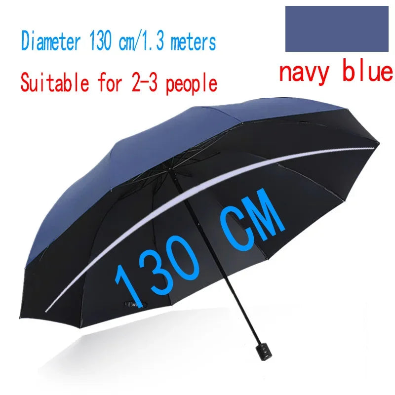 A black and navy blue folding umbrella with 130 cm diameter displayed against a white background.