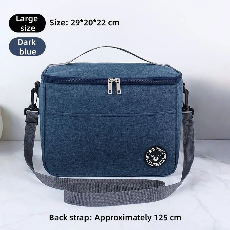 Dark blue thermal insulated lunch bag with a gray adjustable shoulder strap