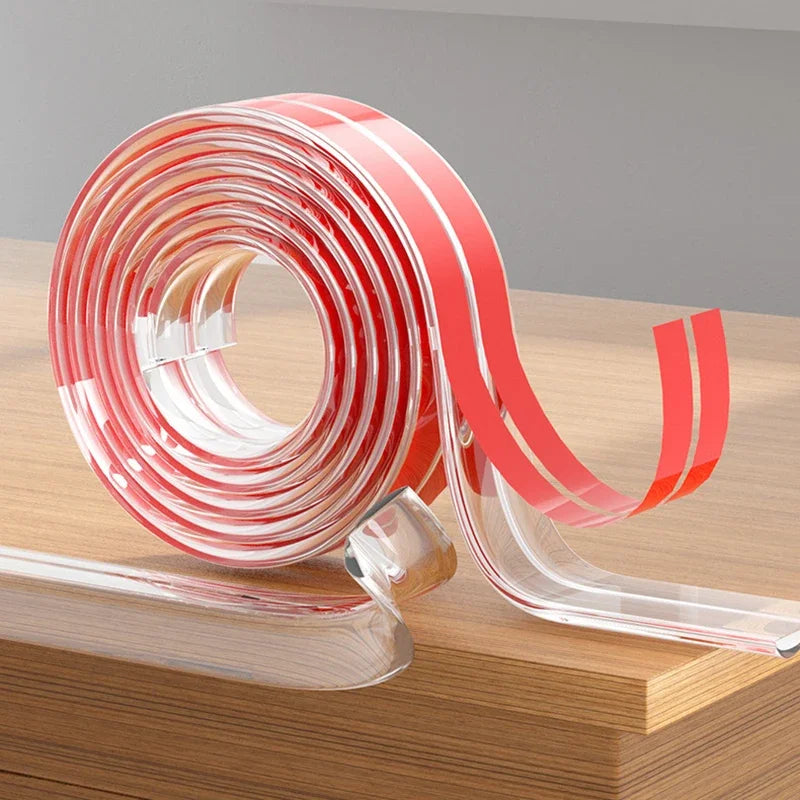 Roll of transparent silicone corner guards for baby safety displayed on a wooden surface.