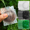 A hand holds a reusable plant rooting ball with a hinged lid, showing three colors: brown, black, and green.