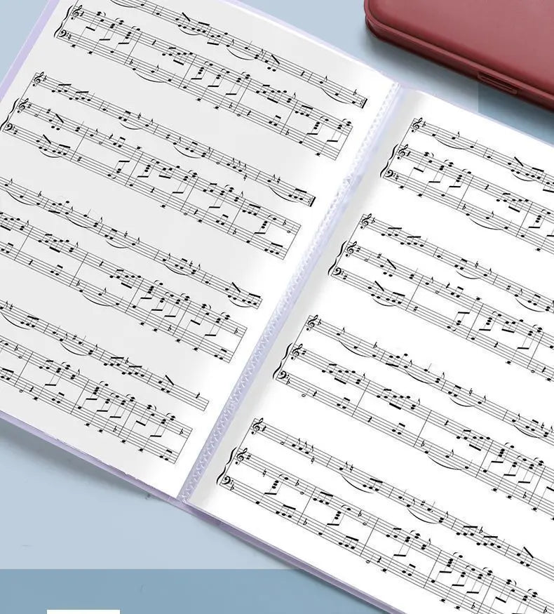 A close-up of an A4 expanding file organizer with clear pocket dividers showing sheet music pages.