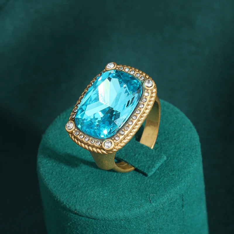 Vintage sea blue crystal cocktail ring set in gold with pave diamonds
