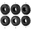 A set of four black mud terrain rubber tires for RC crawlers, labeled A through F.