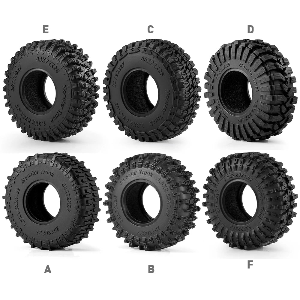 A set of four black mud terrain rubber tires for RC crawlers, labeled A through F.