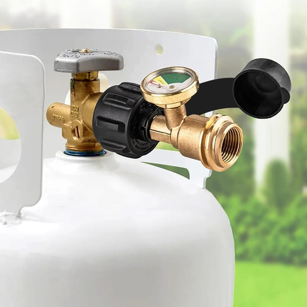 A digital propane tank gauge with a leak detector is attached to a white tank valve.