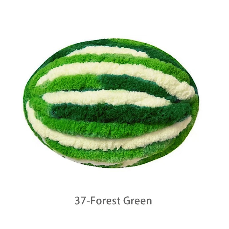 A ball of 37-Forest Green chenille yarn with horizontal stripes of light green and cream.