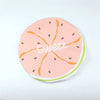A pink fruit design on a waterproof shower cap featuring orange slices and the word sweet