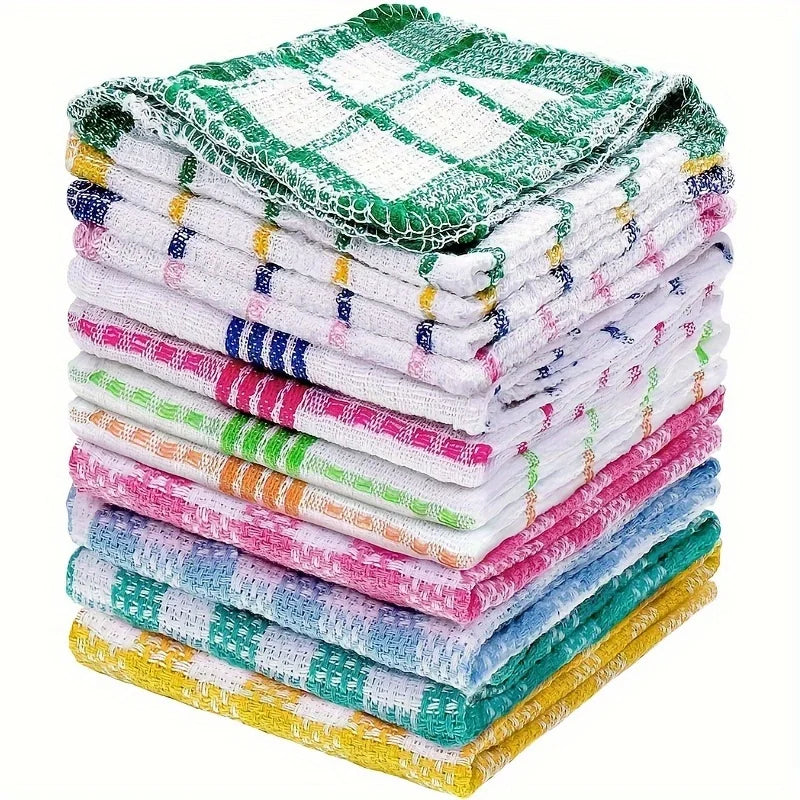 A stack of plaid kitchen towels made of absorbent microfiber dishcloths in various colors like green, white, pink, and blue.