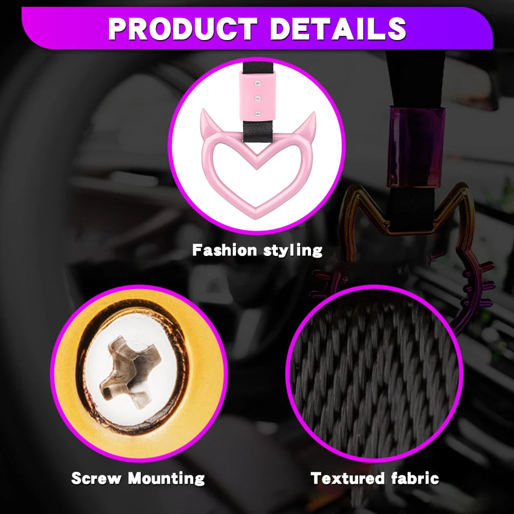 Close-up view of a pink JDM Tsurikawa ring drift handle with a strap showing fashion styling, screw mounting, and textured fa