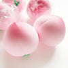 Jouet anti-stress pêche rose moelleux avec emballage en plastique transparent