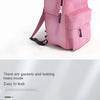 A pink portable pet water bottle and food storage bag with a clear water bottle visible.