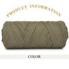 A skein of thick olive green polyester blend yarn for knitting and crochet.