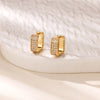 Boucles d'oreilles créoles en zircon cubique ton or