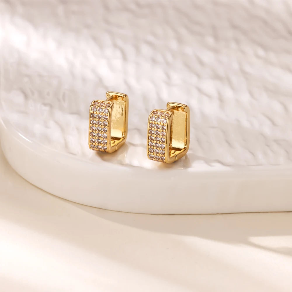 Boucles d'oreilles créoles en zircon cubique ton or