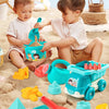A set of 18 plastic beach and sand toys including shovels, cups, and molds for children playing in the sand.