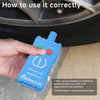 A hand holds a blue electronic tool used to service TPMS sensors on GM, Ford, and Lincoln vehicles.