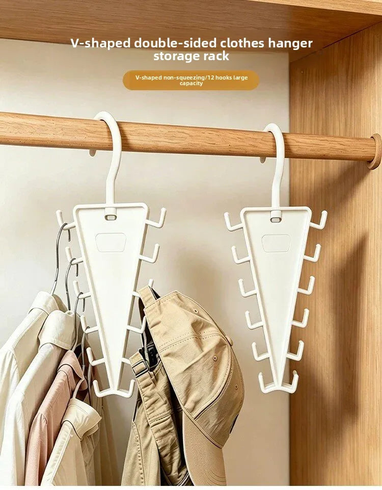 V-shaped double-sided clothes hanger storage rack with 12 hooks mounted on a wooden rod.