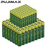A large quantity of green and yellow heavy duty disposable AA and AAA dry cell batteries arranged in rows.