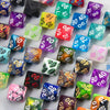 A collection of ten polyhedral dice in various colors and patterns for tabletop role-playing games