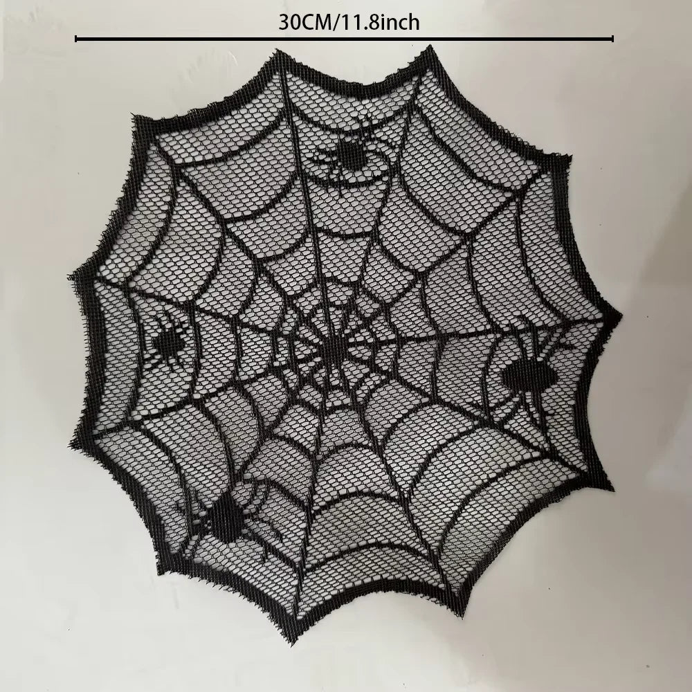 A black disposable spider web Halloween table runner or placemat set.
