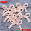 Ten pink embroidered cartoon bow iron-on patches for DIY clothing decoration