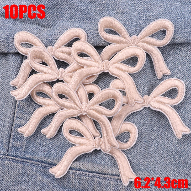 Ten pink embroidered cartoon bow iron-on patches for DIY clothing decoration