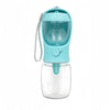 A light blue portable pet water bottle with a clear storage container and a silicone spout.