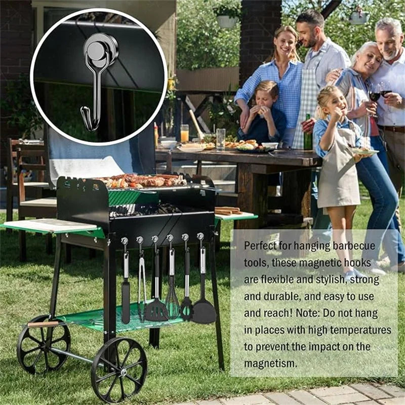 A black rolling rack with magnetic hooks for hanging barbecue tools on a patio table.