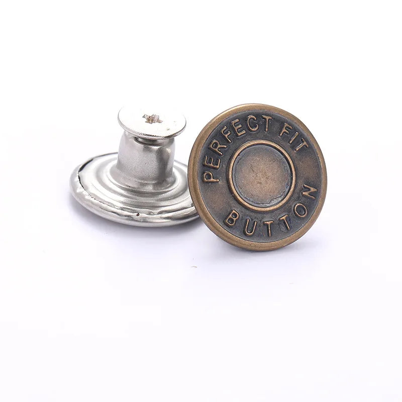A brass button and a silver button with the words PERFECT FIT BUTTON stamped on them.