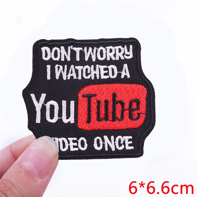 Black embroidered iron-on letter patch with white text saying Don't worry I watched a You Tube video once