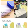 A display showing a blue round corner cutter and a purple beauty horn, demonstrating the product's use for cutting paper and 