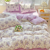 Lavender floral duvet cover set with matching pillowcases featuring purple and white floral patterns.