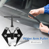 A hand is using a wiper arm puller tool to remove a windshield wiper blade.