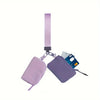 A purple detachable wristlet wallet with a zipper pouch and card slots is shown against a white background.
