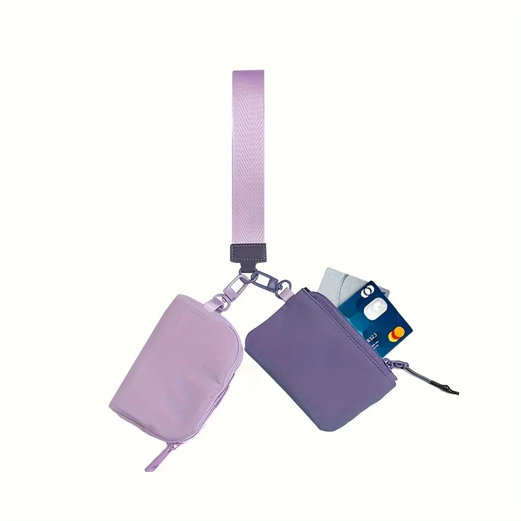 A purple detachable wristlet wallet with a zipper pouch and card slots is shown against a white background.