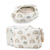 A white fabric diaper caddy organizer with a rainbow print featuring clouds and sun motifs, holding baby diapers.