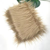 Close-up of light beige soft faux fur fabric for DIY sewing and cosplay