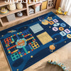 A blue play mat featuring a cartoon car traffic theme with various colorful blocks and puzzles.