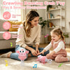 A young girl plays with a pink dancing crab toy on a carpet, demonstrating fine motor skills and sensory development.