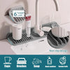 A silicone faucet splash mat with a 6 degree ramp and multiple silicone brushes for kitchen and bathroom use.