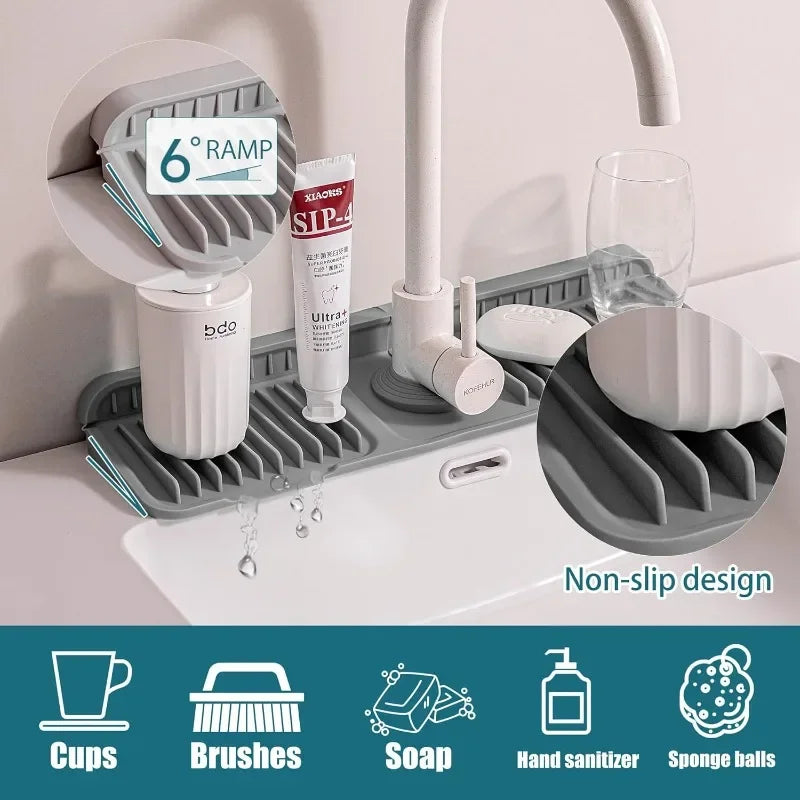 A silicone faucet splash mat with a 6 degree ramp and multiple silicone brushes for kitchen and bathroom use.