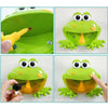 A green frog bath toy with a yellow plunger and bubble features for kids