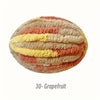 A ball of textured chenille yarn in stripes of peach, yellow, and pink.
