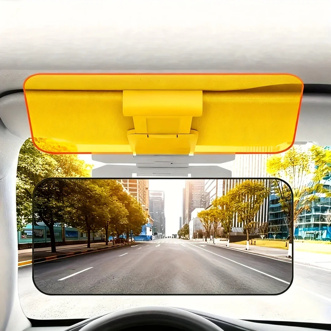 Yellow car sun visor extender with a night shield mounted in a vehicle interior.